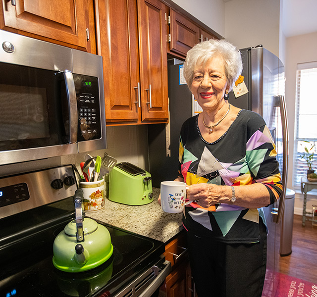 Assisted Living resident in her kitchen